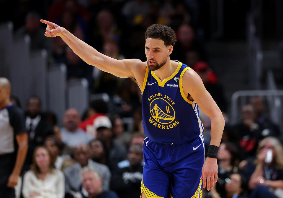 ATLANTA, GEORGIA - FEBRUARY 03:  Klay Thompson #11 of the Golden State Warriors reacts after hitting a three-point basket against the Atlanta Hawks during the second quarter at State Farm Arena on February 03, 2024 in Atlanta, Georgia.  NOTE TO USER: User expressly acknowledges and agrees that, by downloading and/or using this photograph, user is consenting to the terms and conditions of the Getty Images License Agreement.  (Photo by Kevin C. Cox/Getty Images)