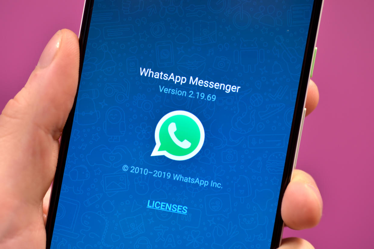 Stock photo of the WhatsApp app icon on a smartphone.