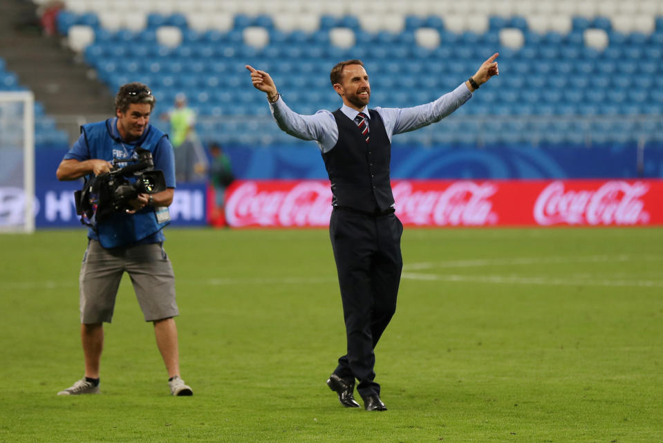 Gareth Southgate celebrates with the England fans following their 2-0 World Cup quarter-final win over Sweden