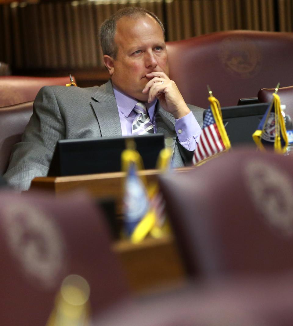 Matt Whetstone listens during the Indiana Alcohol Code Revision Commission meeting in House chambers at the Indiana Statehouse, Tuesday, Oct. 24, 2017.