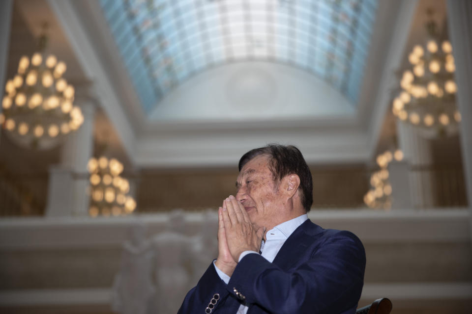 In this Aug. 20, 2019, photo, Huawei's founder Ren Zhengfei reacts during an interview at the Huawei campus in Shenzhen in Southern China's Guangdong province. Ren says its troubles with President Donald Trump are hardly the biggest crisis he has faced while working his way from rural poverty to the helm of China’s first global tech brand. (AP Photo/Ng Han Guan)