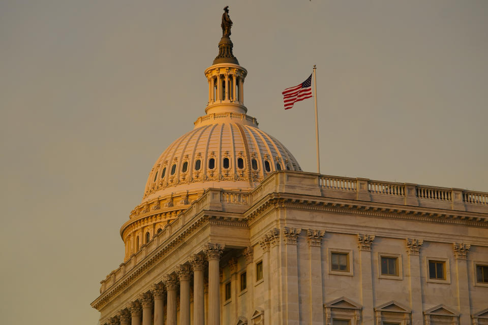 The American flag flies over the House side of the U.S. Capitol as the House meets for a second day to elect a speaker and convene the 118th Congress in Washington, Wednesday, Jan. 4, 2023. (AP Photo/Andrew Harnik)