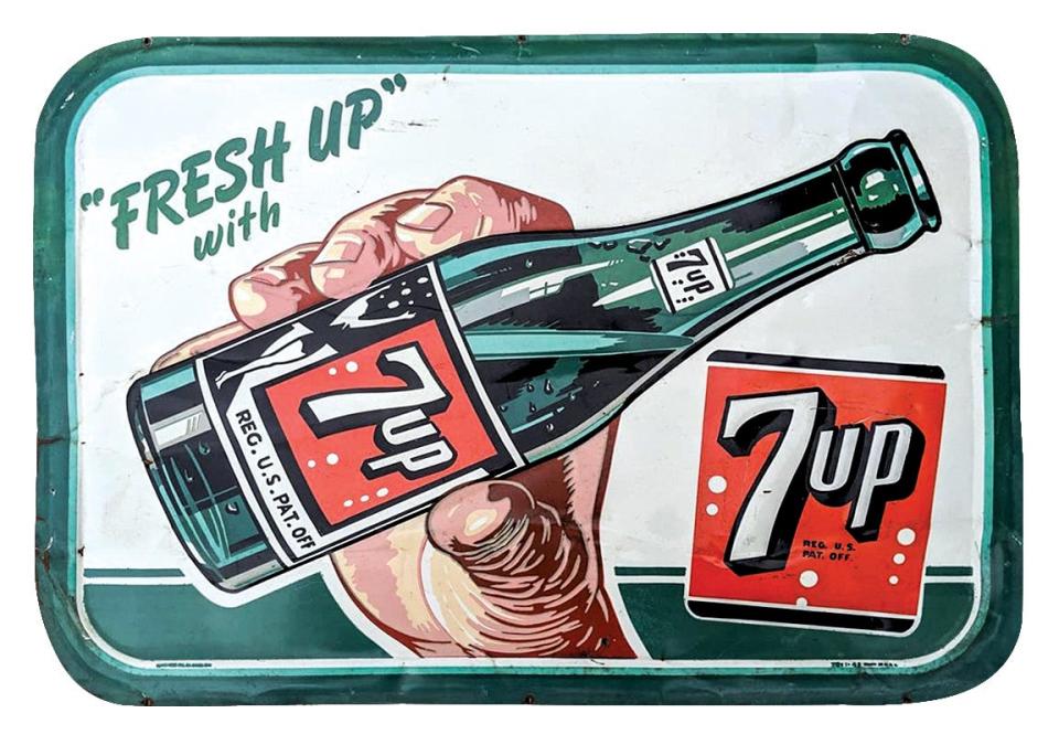 A vintage 7-Up sign.