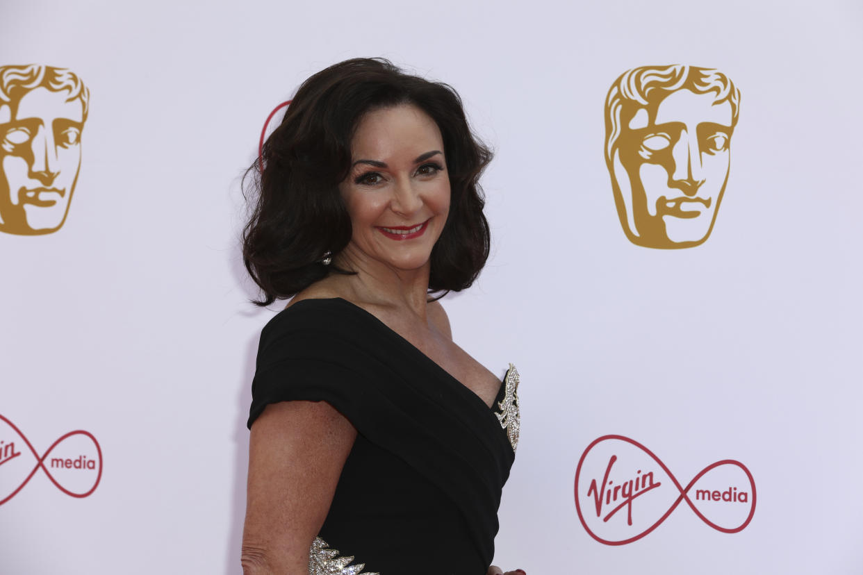 Dance Coach Dame Shirley Ballas poses for photographers on arrival at the 2019 BAFTA Television Awards in London, Sunday, May 12, 2019.(Photo by Grant Pollard/Invision/AP)