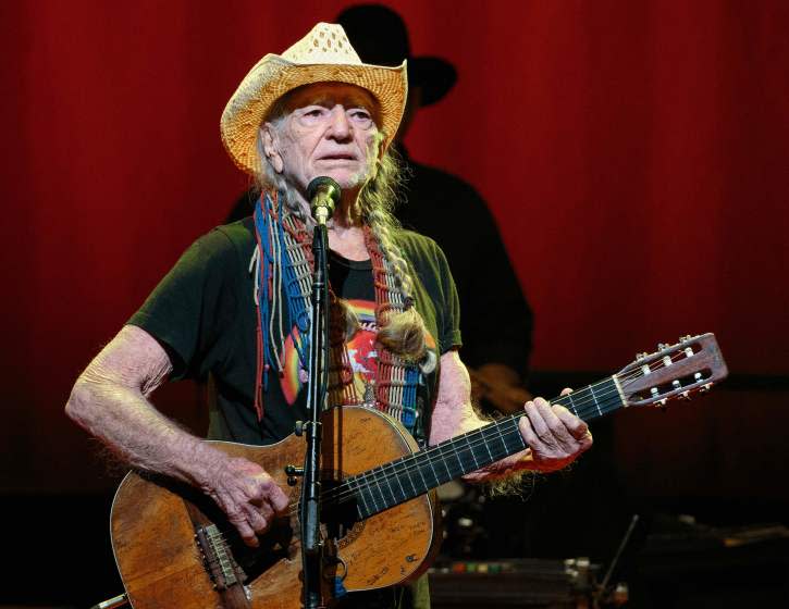 (FILES) In this file photo taken on December 30, 2018, US Country music legend Willie Nelson performs during the "Willie Nelson & Family New Year" concert at Austin City Limits Live in Austin, Texas. - Nelson has canceled the rest of his tour set to run for 30 more shows over a breathing problem. "To my fans, I'm sorry to cancel my tour, but I have a breathing problem that I need to have my doctor check out. I'll be back Love, Willie," the 86-year-old tweeted. (Photo by SUZANNE CORDEIRO / AFP)SUZANNE CORDEIRO/AFP/Getty Images ** OUTS - ELSENT, FPG, CM - OUTS * NM, PH, VA if sourced by CT, LA or MoD **