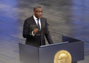 Nobel Peace Prize laureate Denis Mukwege delivers his speech, during the Nobel Peace Prize Ceremony in Oslo Town Hall, in Norway, Monday, Dec. 10, 2018, Dr. Denis Mukwege and Nadia Murad of Iraq, shared the 9-million Swedish kronor ($1 million) Nobel Peace Prize. Mukwege was honored for his work helping sexually abused women at the hospital he founded in the Democratic Republic of Congo. Murad, a Yazidi, won for her advocacy for sex abuse victims after being kidnapped by Islamic State militants. (Berit Roald/NTB scanpix via AP)