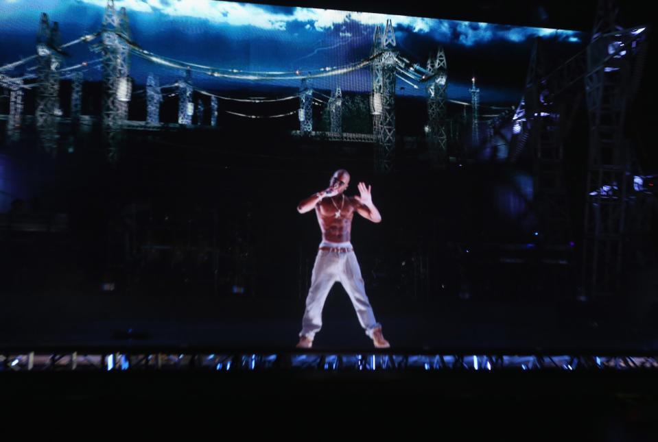 A hologram of deceased rapper Tupac Shakur performs onstage during day 3 of the 2012 Coachella Valley Music & Arts Festival at the Empire Polo Field on April 15, 2012 in Indio, California. (Getty)