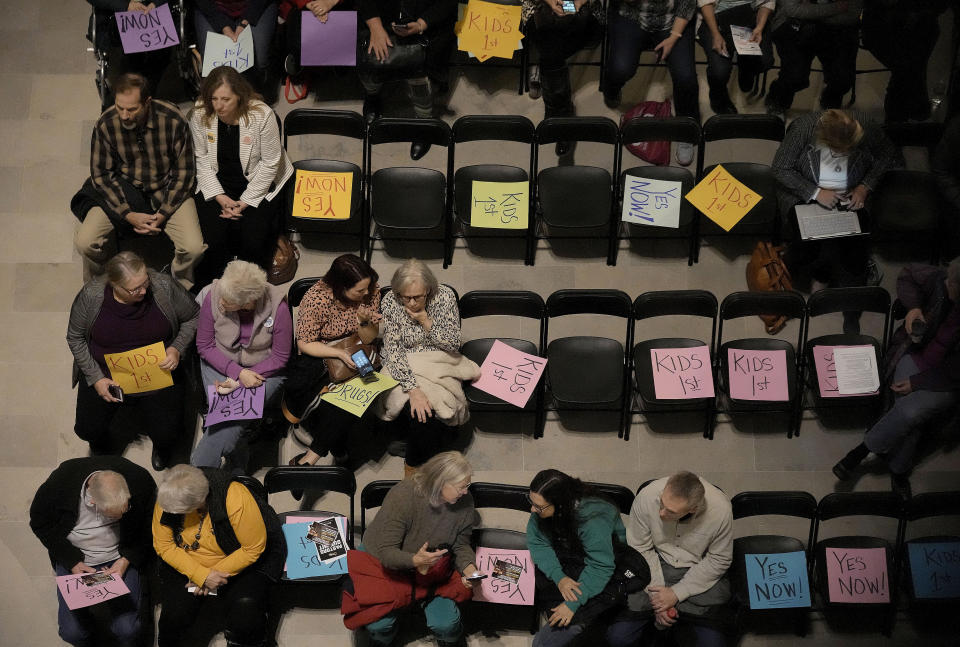 People wait for the start of a rally in favor of legislation banning gender-affirming healthcare for minors, Monday, March 20, 2023, at the Missouri Statehouse in Jefferson City, Mo. (AP Photo/Charlie Riedel)