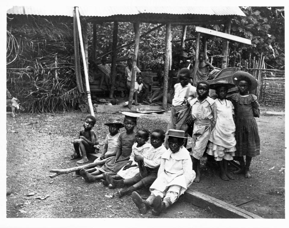 A group of African children pose for a photo in Liberia, taken during a mission trip.