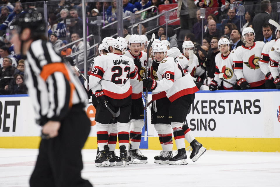 Ottawa Senators forward Brady Tkachuk (7) celebrates with teammates after scoring against the Toronto Maple Leafs during the third period of an NHL hockey game Friday, Jan. 27, 2023, in Toronto. (Christopher Katsarov/The Canadian Press via AP)