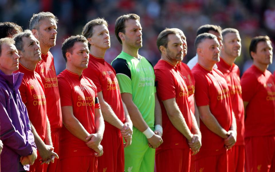 Liverpool players remember Ronnie Moran during the charity match at Anfield, Liverpool - Credit: PA