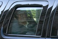 US President Donald Trump watches from the motorcade as he returns to the White House in Washington, DC, after playing golf on November 7, 2020. - Joyous celebrations erupted in Washington on Saturday after Joe Biden was declared winner of the US presidency, as several people poured into the streets of the US capital -- some of them chanting, cheering and singing in front of the White House. (Photo by ALEX EDELMAN / AFP) (Photo by ALEX EDELMAN/AFP via Getty Images)