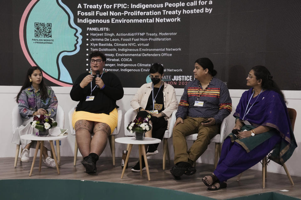 From right, Jyoti Awasthi, moderator, Thomas Joseph, Indigenous Environmental Network, Eriel Deranger, Indigenous rights, gender justice & challenging capitalism and colonialism, Fleur Ramsay, Samoan, Head of Litigation and Climate Lead, Xiye Bastida, of Mexico, participate in a session on fossil fuels at the Indigenous Peoples Pavilion at the COP27 U.N. Climate Summit, Friday, Nov. 11, 2022, in Sharm el-Sheikh, Egypt. (AP Photo/Nariman El-Mofty)