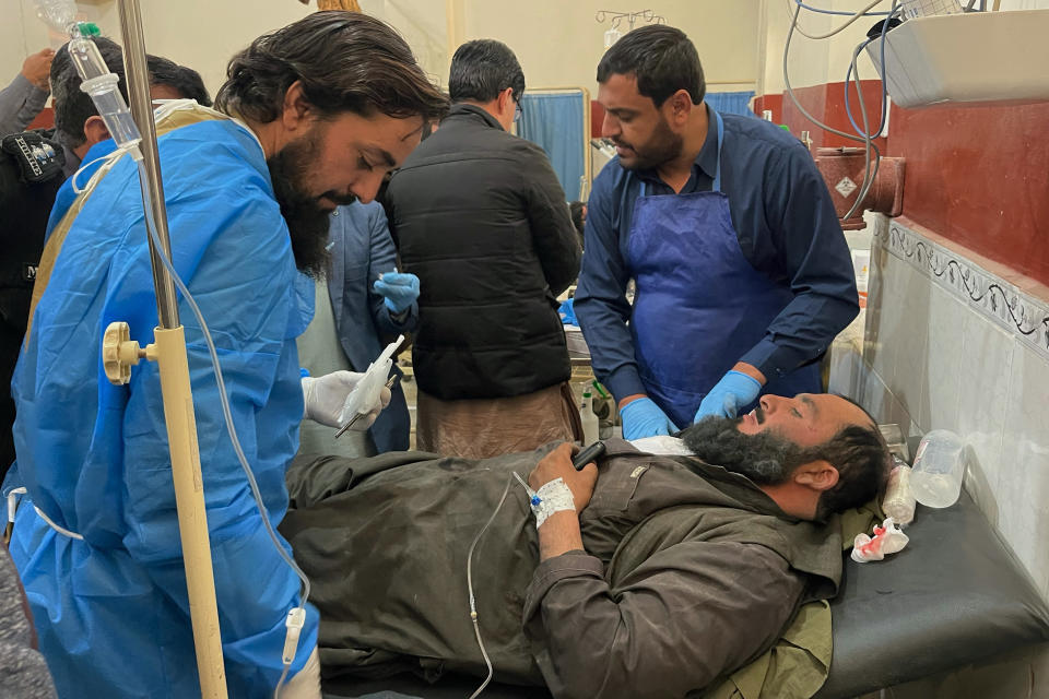 A man injured by the Afghan forces shelling receives treatment at a hospital in Chaman, southwestern Pakistan along the Afghan border, Thursday, Dec. 15, 2022. Pakistani authorities on Thursday accused Afghan Taliban forces of indiscriminately firing mortars toward the civilian population near the southwestern Chaman border crossing, killing and wounding some people, a sign of increasing tension between the two neighbors. (AP Photo)