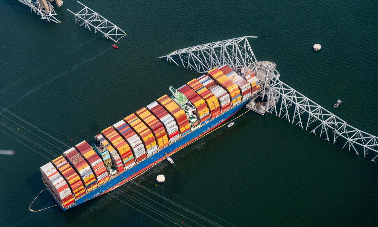 <span>The Dali container vessel after striking the Francis Scott Key Bridge that collapsed into the Patapsco River in Baltimore, Maryland, US, on Tuesday.</span><span>Photograph: Al Drago/Bloomberg via Getty Images</span>