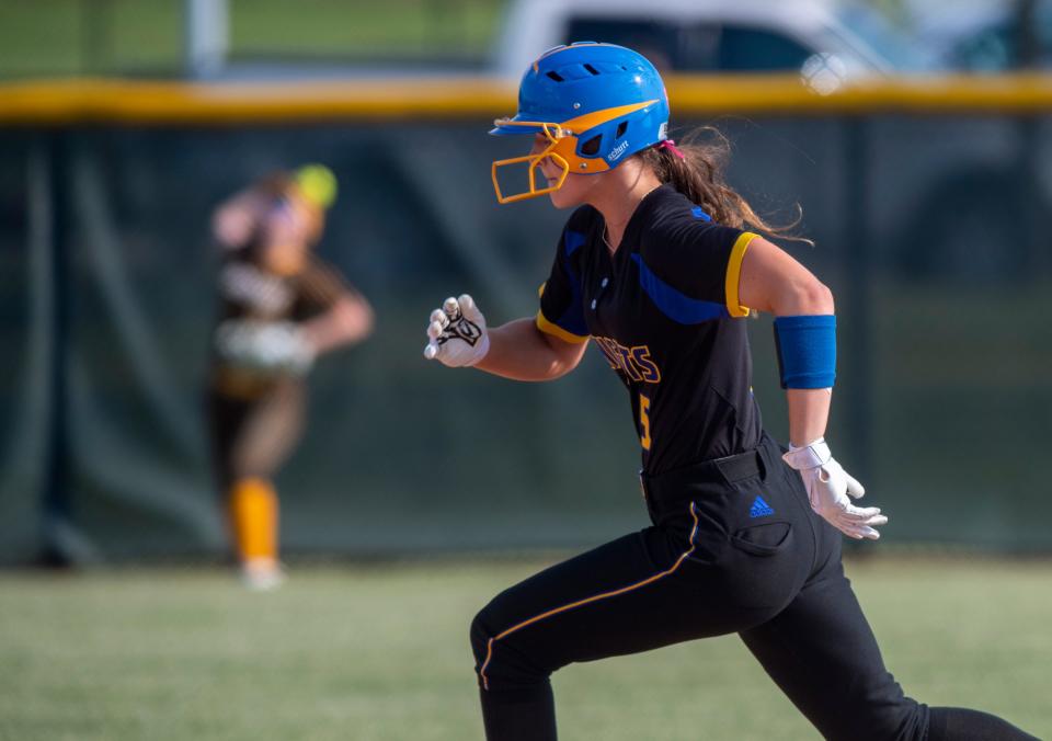 Castle's  Aubrey Baker (5) runs for second as the Castle Knights play the Central Bears during the 2023 IHSAA 4A softball sectional at North high School Tuesday, May 23, 2023.
