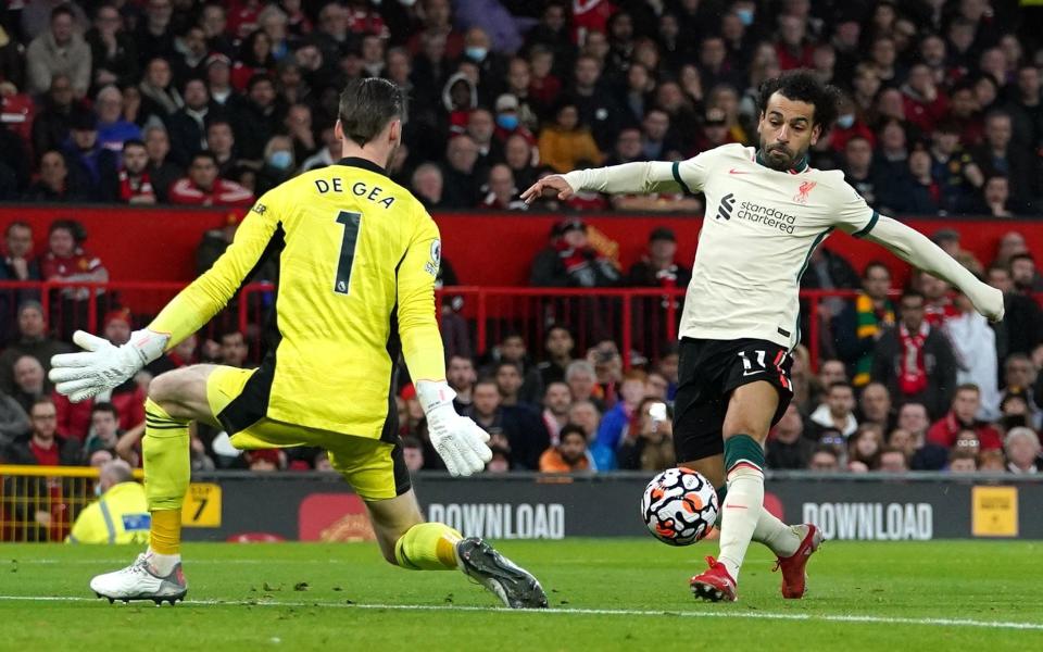 Mohamed Salah scores his third goal of the game at Old Trafford - PA