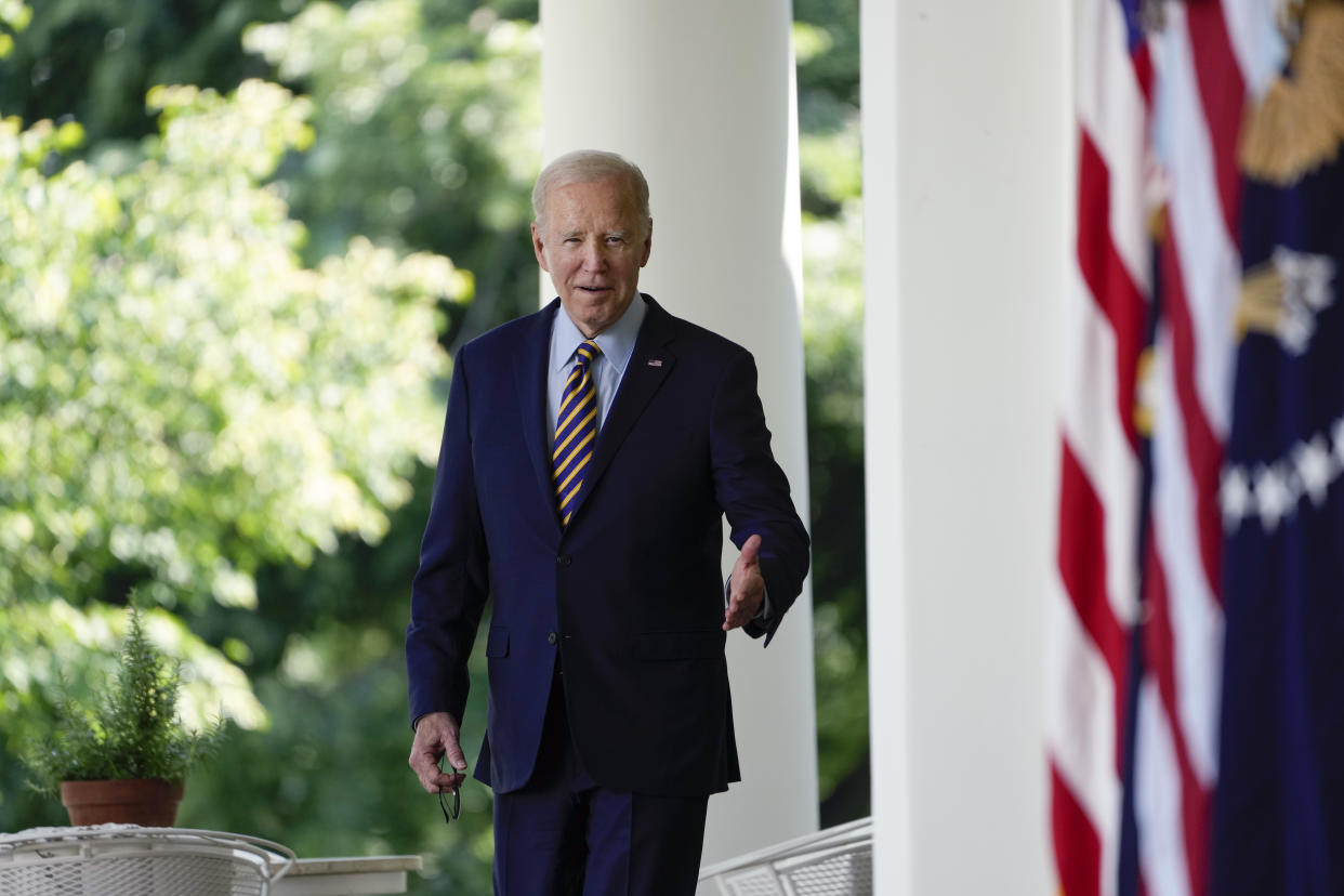 President Joe Biden walks to the Rose Garden of the White House in Washington, Thursday, May 11, 2023, to speak about conservation efforts taken by his administration. (AP Photo/Susan Walsh)