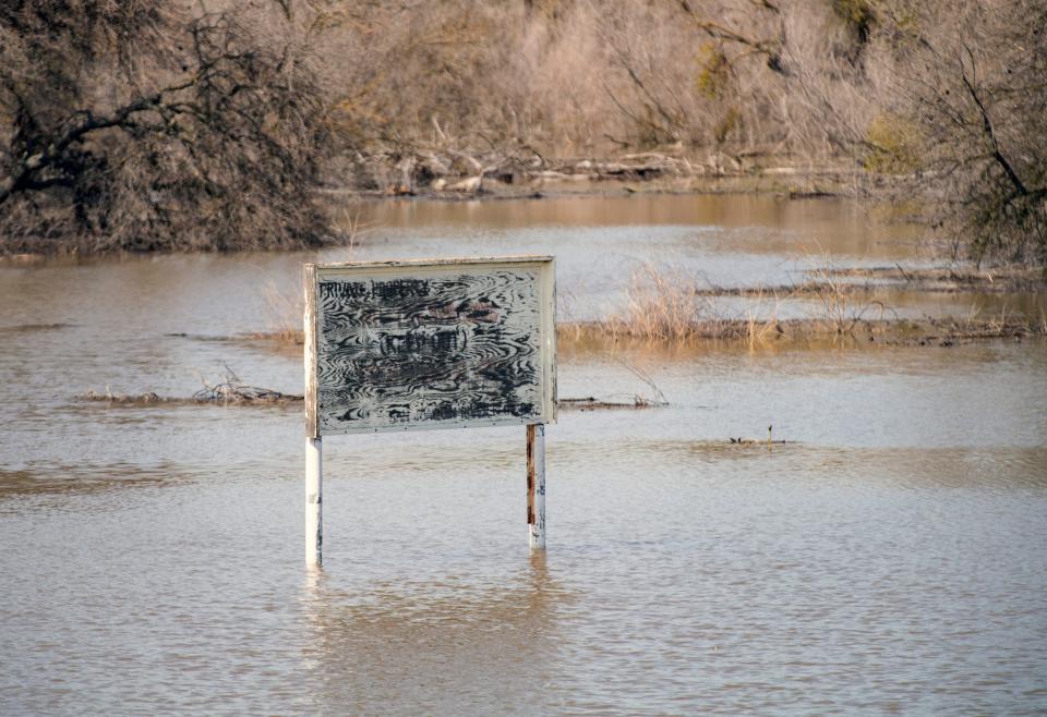 The water level on the San Joaquin River near Vernalis in south San Joaquin County is at flood stage on Friday, Mar. 17, 2023. The rivers is expected to reach danger stage by Saturday.