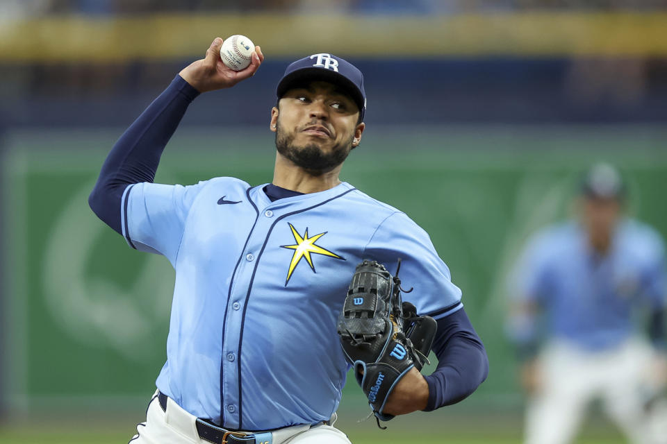 Tampa Bay Rays starting pitcher Taj Bradley throws against the Washington Nationals during the first inning of a baseball game, Sunday, June 30, 2024, in St. Petersburg, Fla. (AP Photo/Mike Carlson)