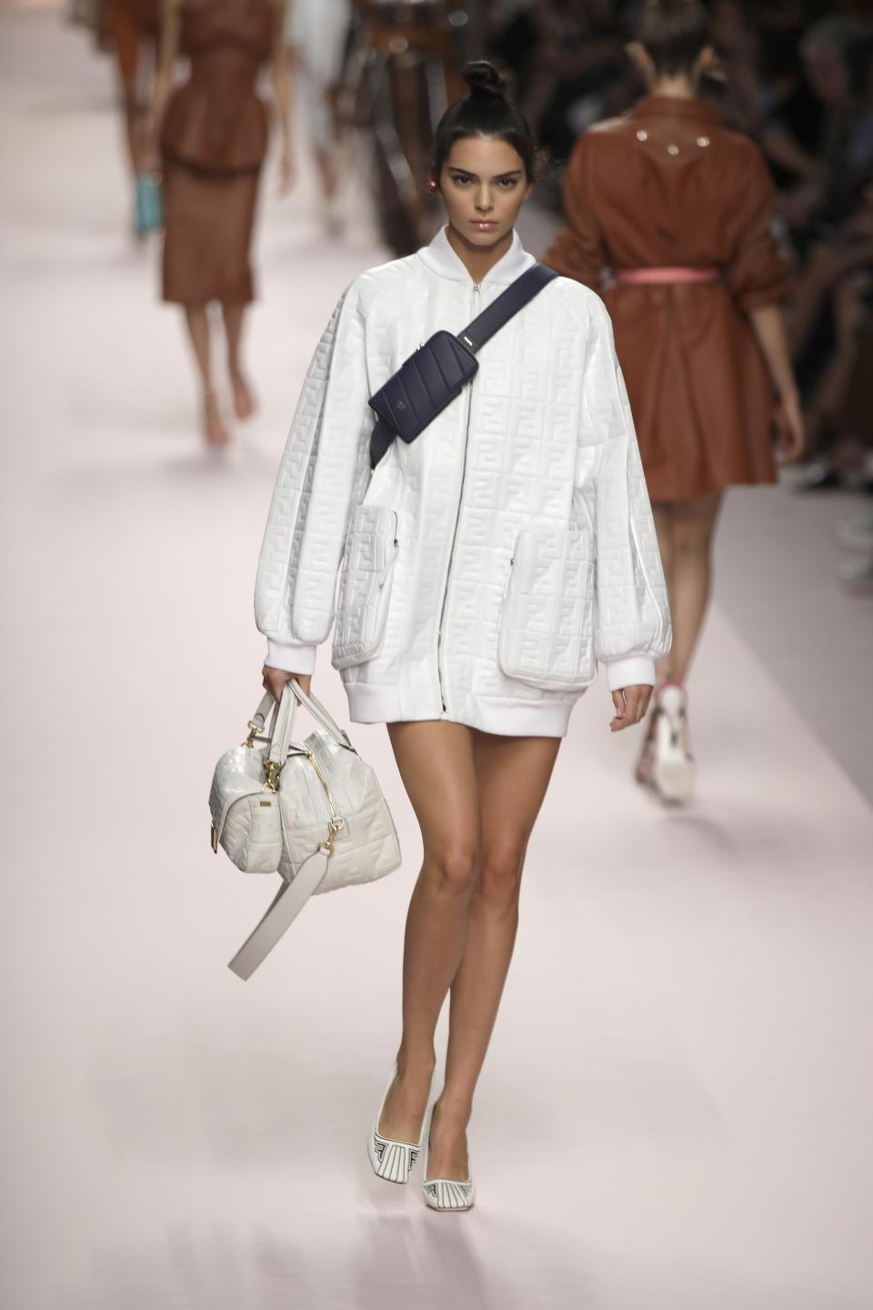 FILE - Model Kendall Jenner wears a creation as part of the Fendi women's 2019 Spring-Summer collection, unveiled during the Fashion Week in Milan, Italy on Sept. 20, 2018. (AP Photo/Luca Bruno, File)