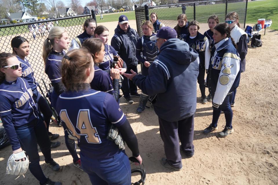 Indian Hills coach Joe Leicht talks to his team in between innings of their game against Jefferson, as they participated in the Blue and Gold Softball Tournament held in Pompton Plains, NJ on April 8, 2023.