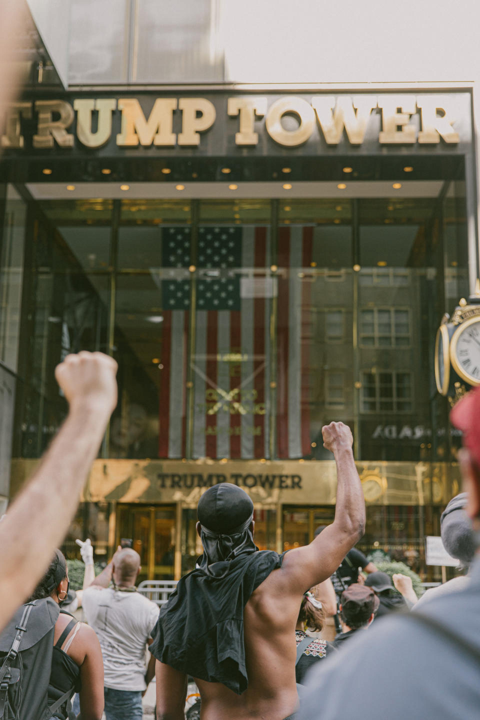 Protestors marching down 5th Avenue stop and stand before Trump Tower in New York City, May 30, 2020. | Mark Clennon