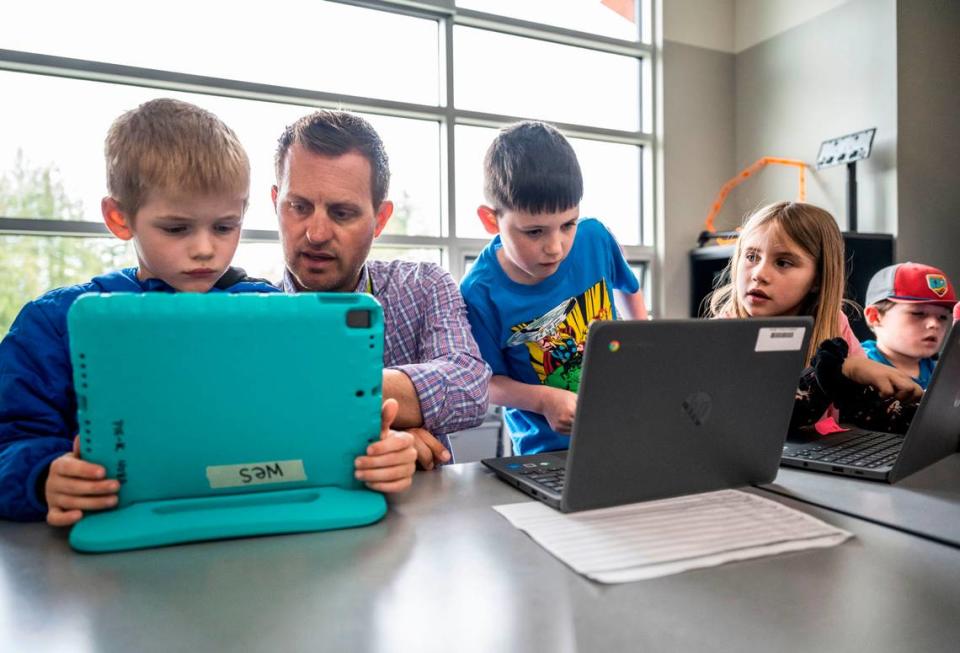 Pioneer Elementary School teacher Justin Towner instructs kindergarten and first-grade students during their 40-minute innovation class in Gig Harbor, Wash. on May 1, 2023.