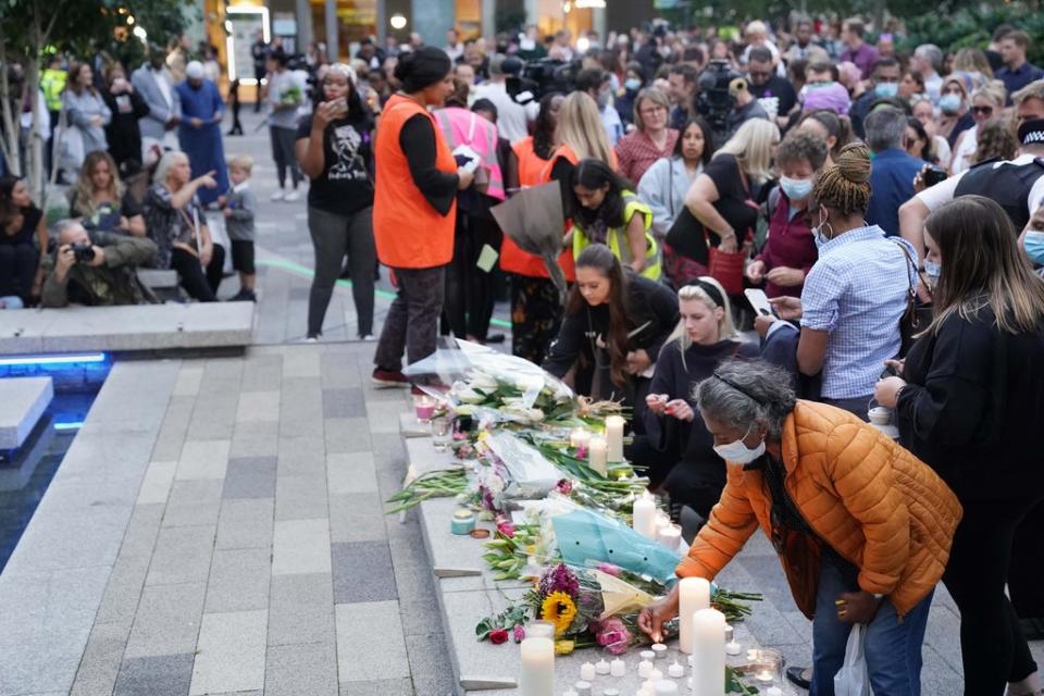 Members of the public attend a vigil in memory of Sabina Nessa, and in solidarity against violence against women, at Pegler Square in Kidbrooke (Jonathan Brady/PA) (PA Wire)