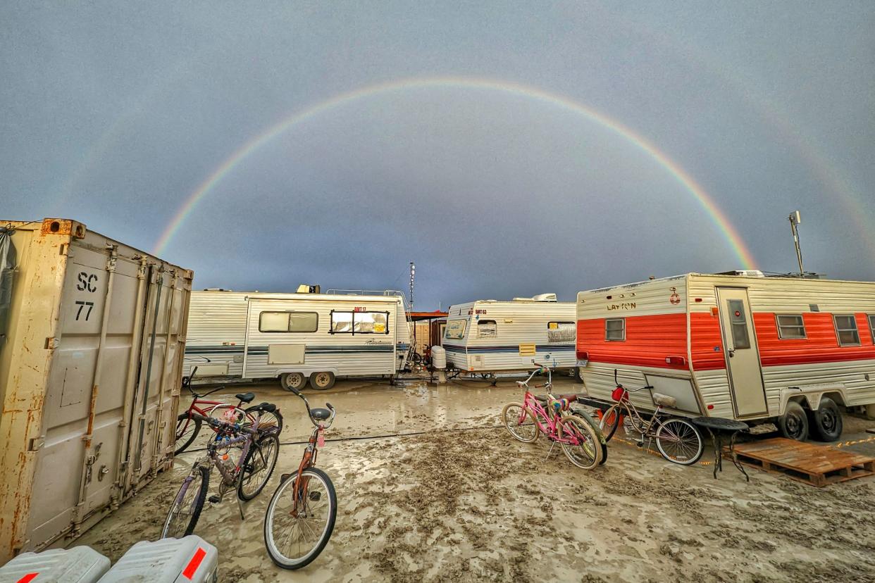 This handout image provided courtesy of Josh Lease on September 3, 2023 shows a double rainbow over flooding on a desert plain on September 1, 2023, (UGC/AFP via Getty Images)