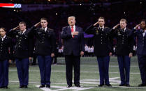 <p>President Donald Trump sings the national anthem before the NCAA college football playoff championship game between Georgia and the AlabamaMonday, Jan. 8, 2018, in Atlanta. (AP Photo/David J. Phillip) </p>