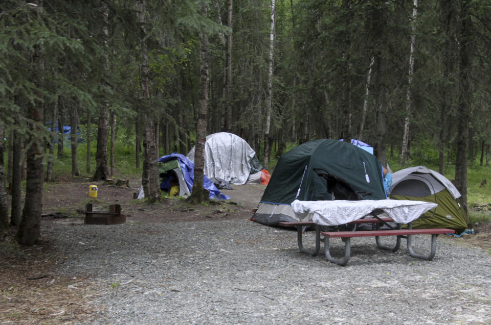 Tents are shown Wednesday, July 6, 2022, inside Centennial Park in Anchorage, Alaska. State wildlife officials have killed four black bears in a campground recently set aside for the city's homeless population after Anchorage's largest shelter was closed. (AP Photo/Mark Thiessen)