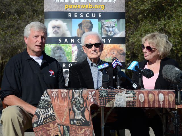 <p>Amy Dempsey/Toronto Star/Getty</p> PAWS co-founder Ed Stewart (left) at a news conference with Bob Barker (center) and Nancy Burnet (right)