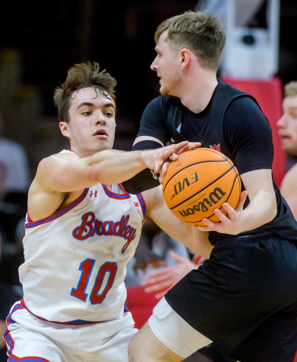 Bradley's Connor Hickman (10) pressures Illinois State's Colto Sandage in the second half Wednesday, Jan. 25, 2023 at Carver Arena. The Braves downed the Redbirds 79-75 in overtime.