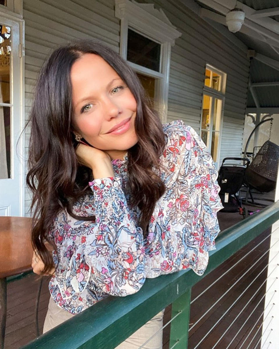 Tammin Sursok wearing a pink and blue floral blouse. Photo: Instagram/tamminsursok.