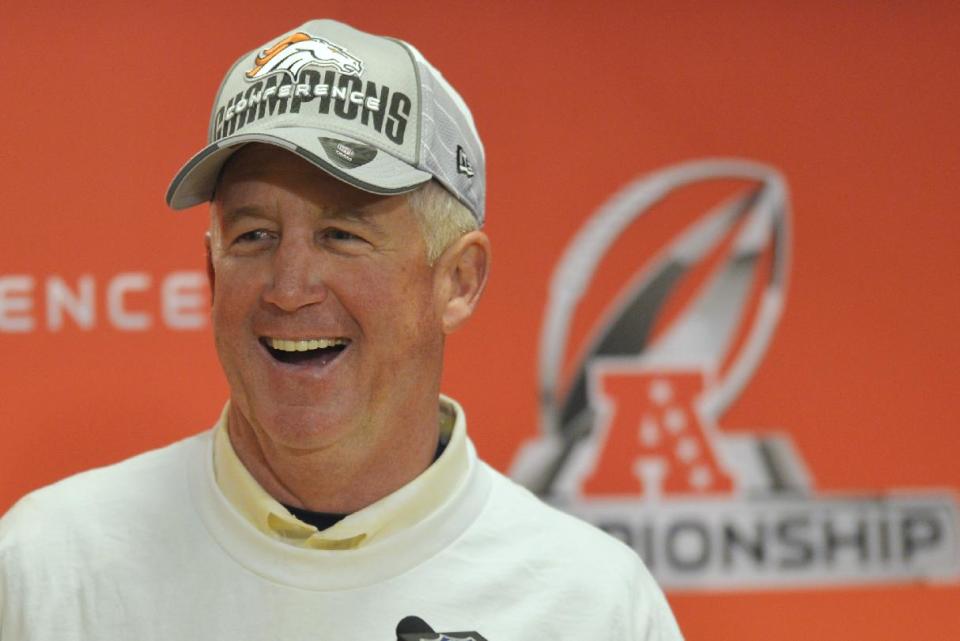 Denver Broncos head coach John Fox smiles during a press conference following the AFC Championship NFL playoff football game against the New England Patriots in Denver, Sunday, Jan. 19, 2014. The Broncos defeated the Patriots 26-16 to advance to the Super Bowl. (AP Photo/Jack Dempsey)