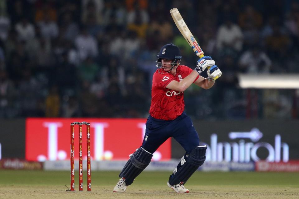 England's Harry Brook plays a shot during the seventh twenty20 cricket match between Pakistan and England, in Lahore, Pakistan, Sunday, Oct. 2, 2022. (AP Photo/K.M. Chaudary)