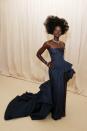 <p>While there was plenty of amazing fashion to be seen last night, the Met Gala theme of 'American Independence' was not always obvious with every single look. However, Lupita Nyong'o ticked all the right boxes with her denim Versace ballgown, which definitely nodded to all things USA.</p>