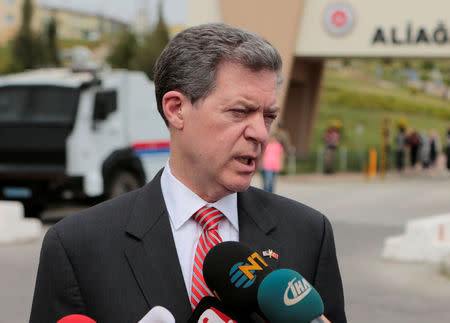 U.S. envoy for religious freedom Sam Brownback talks to media outside the Aliaga Prison and Courthouse complex in Izmir, Turkey April 16, 2018. REUTERS/Sadi Osman Temizel