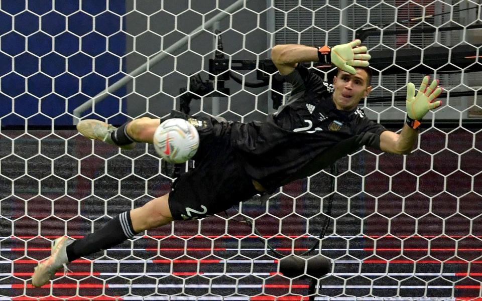 Emi Martinez saved three penalties against Colombia at the 2021 Copa America - AFP via Getty Images/Nelson Almeida