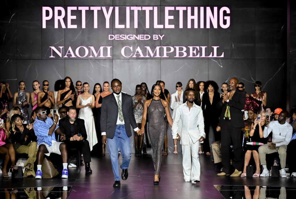 Designers Victor Anate, left, Naomi Campbell and Edwin Thompson walk the runway at the PrettyLittleThing x Naomi Campbell Spring/Summer 2024 fashion show as part of New York Fashion Week on Tuesday, Sept. 5, 2023 in New York.