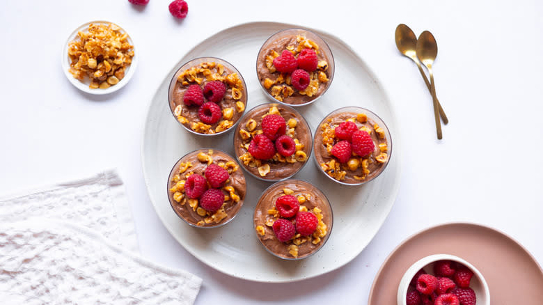 chocolate mousse pots on plate 