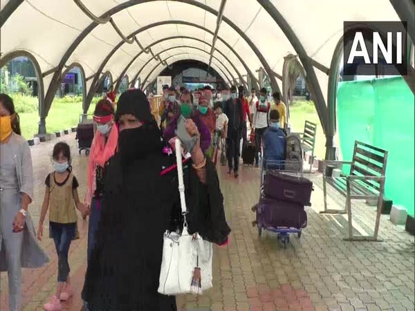 Migrant workers who went back to their native places during the lockdown have now started returning to Surat via flights. (Photo/ANI)  