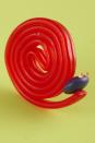 <p>Grab your favorite licorice from the pantry and get going. Loosen the end of one of the wheels and wedge a colored M&M's candy in the space to create this tasty snail cake topper.</p><p>Get the <strong><a href="https://www.womansday.com/food-recipes/food-drinks/recipes/a11415/chocolate-haunted-forest-cake-recipe-wdy1013/" rel="nofollow noopener" target="_blank" data-ylk="slk:Red Snails recipe;elm:context_link;itc:0;sec:content-canvas" class="link ">Red Snails recipe</a></strong><strong>.</strong></p>