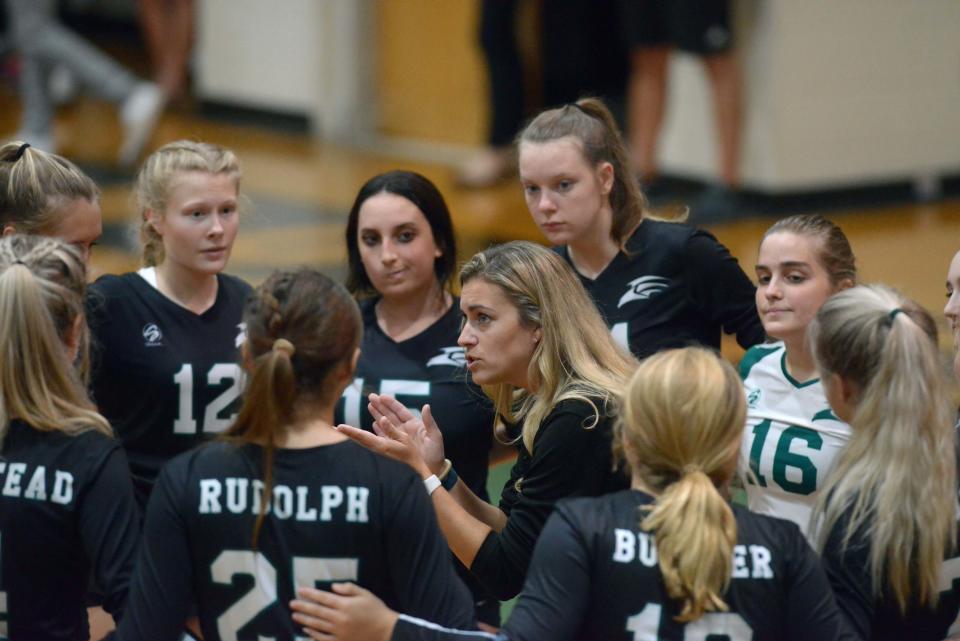 South Walton High School Volleyball Coach Meaghan Allen talks with her team during Tuesday night's regional quarterfinals match against Bolles.