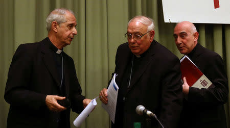 Buenos Aires' Archbishop Cardinal Mario Poli, Jose Maria Arancedo, Santa Fe's Archbishop and President of the Episcopal Conference of Argentina and Chascomus Bishop Carlos Malfa leave after a news conference where they talked about the Vatican's declassification of documents related to Argentina's last military dictatorship in Buenos Aires, Argentina, October 25, 2016. REUTERS/Marcos Brindicci