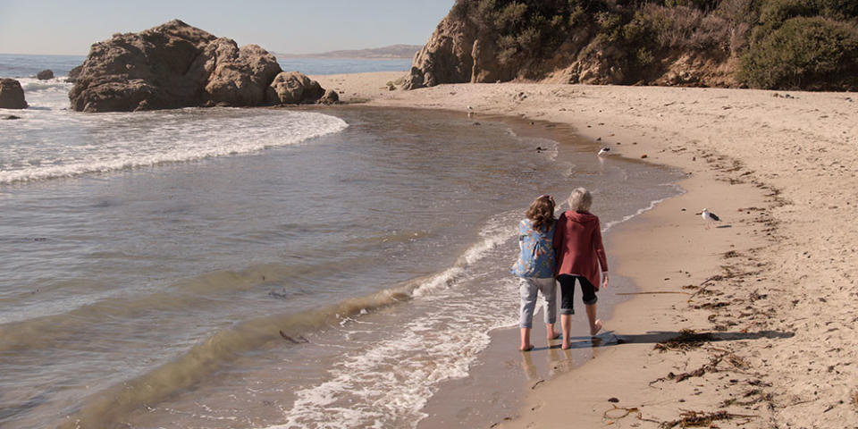 Frankie (Lily Tomlin) and Grace (Jane Fonda) walk along the beach to the tune of “You’re All I Need to Get By” to end the series. - Credit: Courtesy of Netflix/