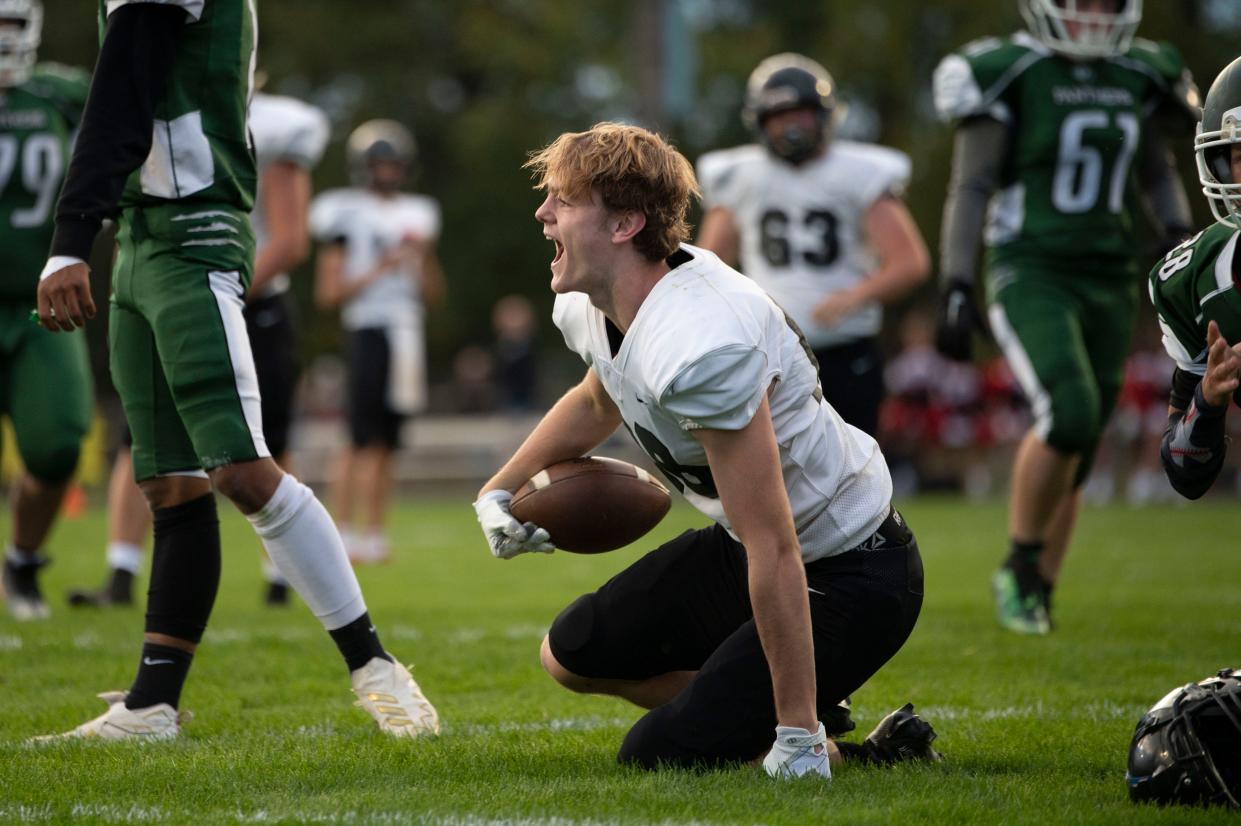 Marshall Junior Jake Jacoby celebrates a touchdown during a game at Pennfield High School on Friday, Sept. 23, 2022.