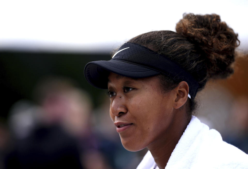 Japan's Naomi Osaka at the All England Lawn Tennis and Croquet Club ahead of the Wimbledon tennis championships in London, Sunday, June 30, 2024. (John Walton/PA via AP)