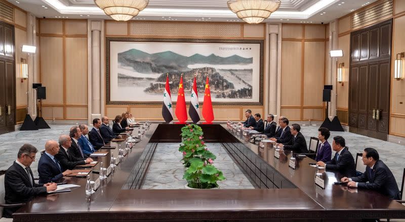 Chinese President Xi Jinping meets with Syria's President Bashar al-Assad in eastern Hangzhou city